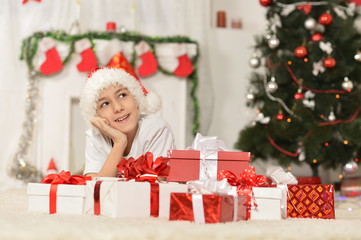 Obraz na płótnie Canvas Happy kid celebrating christmas