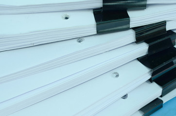 pile of document on desk