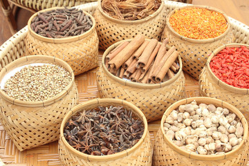 Spices, herbs in bamboo basket