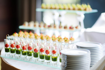 Plates with assorted snacks on an event party
