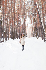 young woman in a winter park