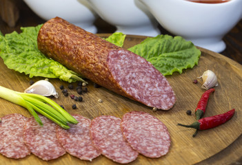 sausage on a wooden plate in a restaurant
