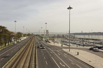 Brasilia Avenida in Lisbon, with a little harbour and Tagus river in the background