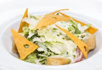 Caesar salad on the table in a restaurant