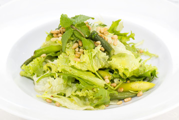 vegetable salad with asparagus on a table in a restaurant