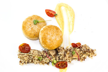 chicken cutlet with quinoa porridge on a table in a restaurant