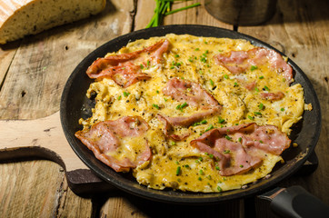 Fototapeta na wymiar Rustic omelette with famous Prague ham