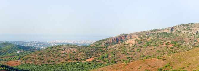 Fototapeta na wymiar Mountains and valley with Chania city on Crete.