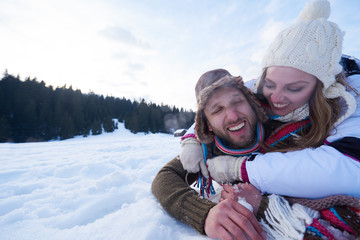 Obraz premium romantic young couple on winter vacation