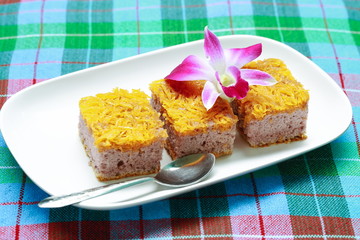 Gold Egg Yolk Thread Cakes on white plate