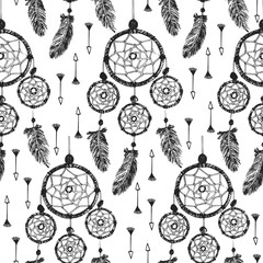 Hand-drawn with ink dreamcatcher with feathers, arrows. Seamless pattern. Ethnic illustration, tribal, American Indians traditional symbol.