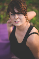 Fototapeta na wymiar girl doing yoga in park on autumn day