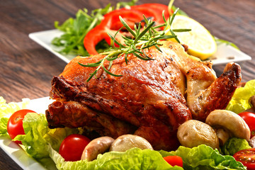 Roasted chicken with tomatoes and mushrooms