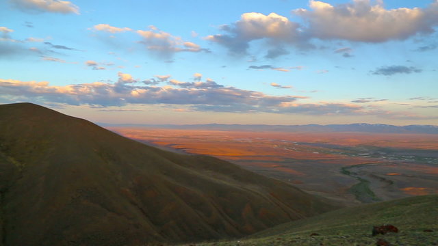 Chuya River Valley landscape in the Altai Mountains at sunset, pan view
