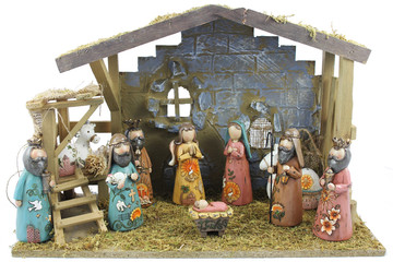 Christmas nativity scene of the birth of Jesus depicted with figurines