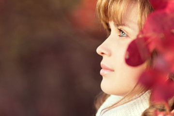 Autumn portrait of a beautiful girl