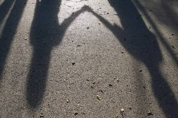 Shadow of woman hold hands