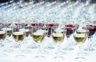 glasses with wine in row