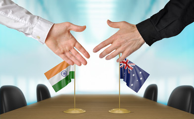 India and Australia diplomats agreeing on a deal