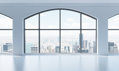 An empty modern bright and clean loft interior. Huge panoramic windows with New York city view. A...