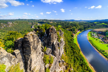 View from viewpoint of Bastei in Saxon Switzerland Germany to the town city and the river Elbe on a...