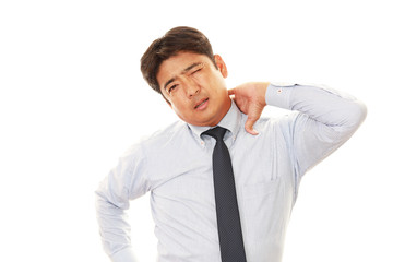肩こりに悩む男性