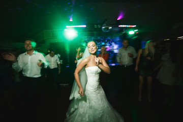 beautiful bride and groom dancing 
