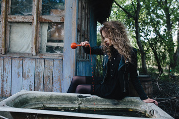 Vintage witch with elixir in hand
