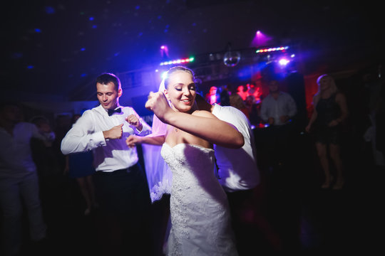 beautiful bride and groom dancing 