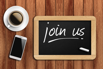 coffee, phone  and chalkboard with  word work join us
