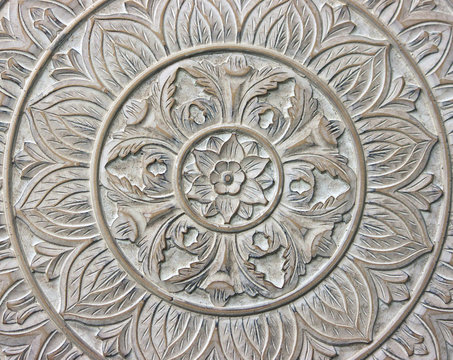 Circular Pattern of a Flower Carved in Stone