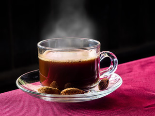 glass cup of hot coffee ready to serve