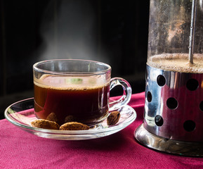 glass of hot coffee ready to serve in the countryside nature