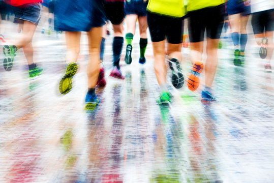 blurred image of people running