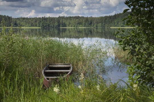 boat at shoreline in Lake in Karula Rahvuspark