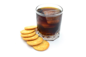 crackers and cola on white background