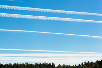 Chemtrails on blue sky
