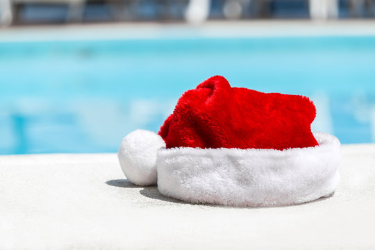 Santa Claus Hat Near Swimming Pool