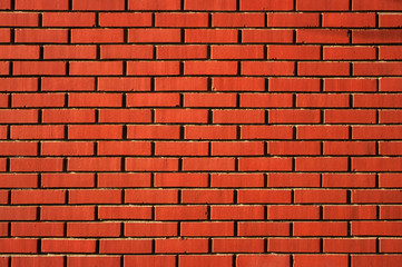 The wall built of bricks, close-up view.