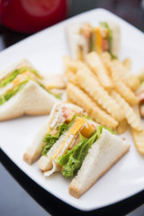 club sandwich with french fries