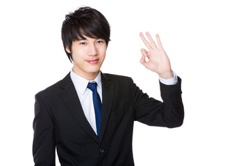 Asian Businessman with ok sign gesture