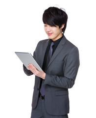 Young Businessman use of the tablet pc