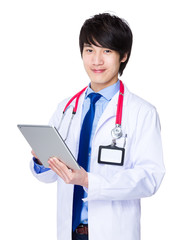 Male Doctor use of the digital tablet pc