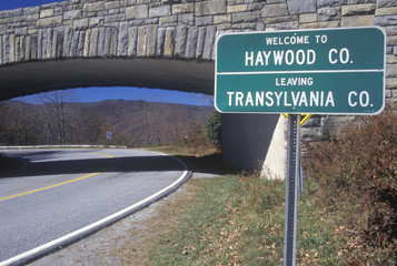 A sign that reads ÒWelcome to Haywood Co.; Leaving Transylvania Co.Ó