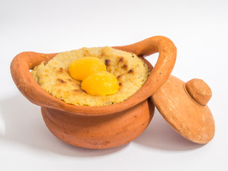 Thai Dessert (Khanom Wan Thai) name is coconut custard squares in brown pottery pots.Has golden threads on the top of dessert.