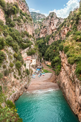 Beach between rocks in the gorge. fiordo di furore Amalfi coast Italy - obrazy, fototapety, plakaty