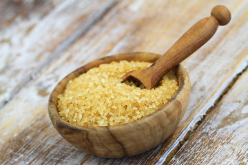Brown sugar in bamboo bowl, closeup
