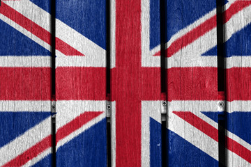 Fototapeta premium united kingdom flag on wood background