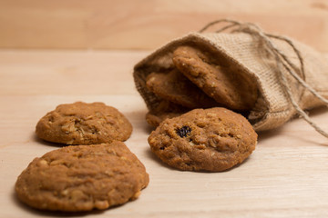Cookie in woven sack on wood