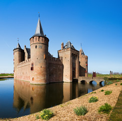 Fototapeta na wymiar The Muiderslot with moat in Muiden, The Netherlands